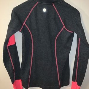 Grey and pink 3/4 zip up activewear top